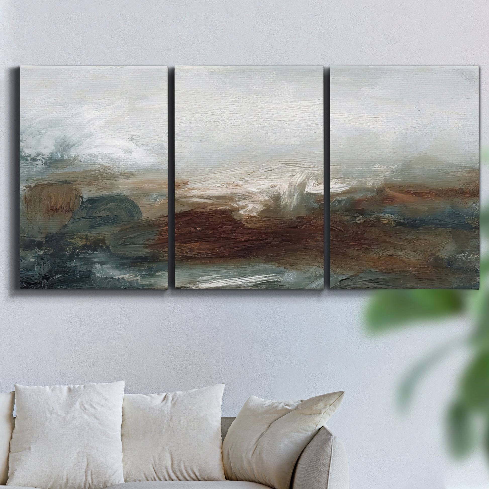 Three-panel canvas wall art featuring soft abstract evening light, displayed in a living room above a sofa.