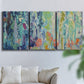Three-panel canvas wall art featuring abstract rainfall with butterfly forms, displayed in a living room above a sofa.