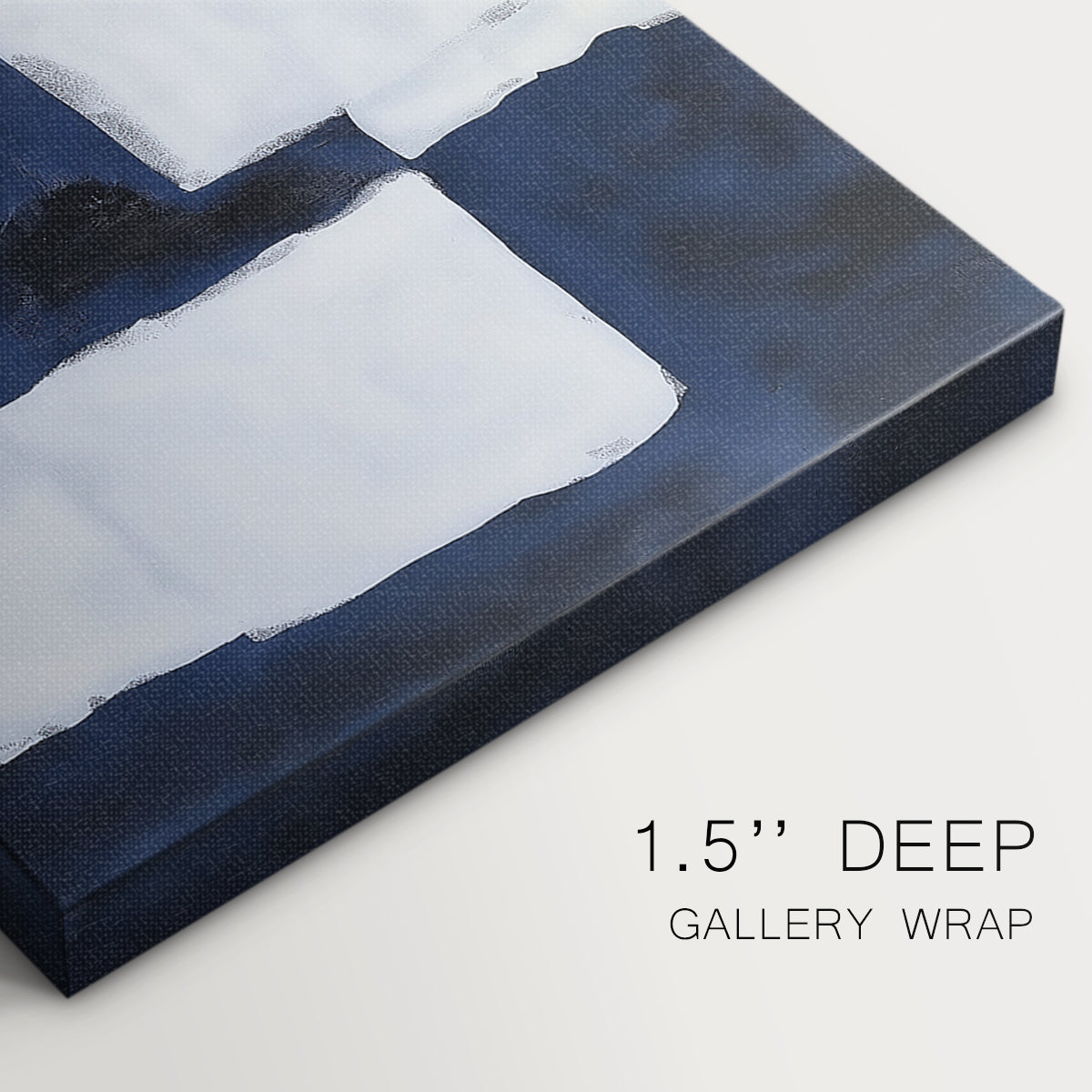 Abstract artwork featuring a contrast of navy blue and white shapes on canvas