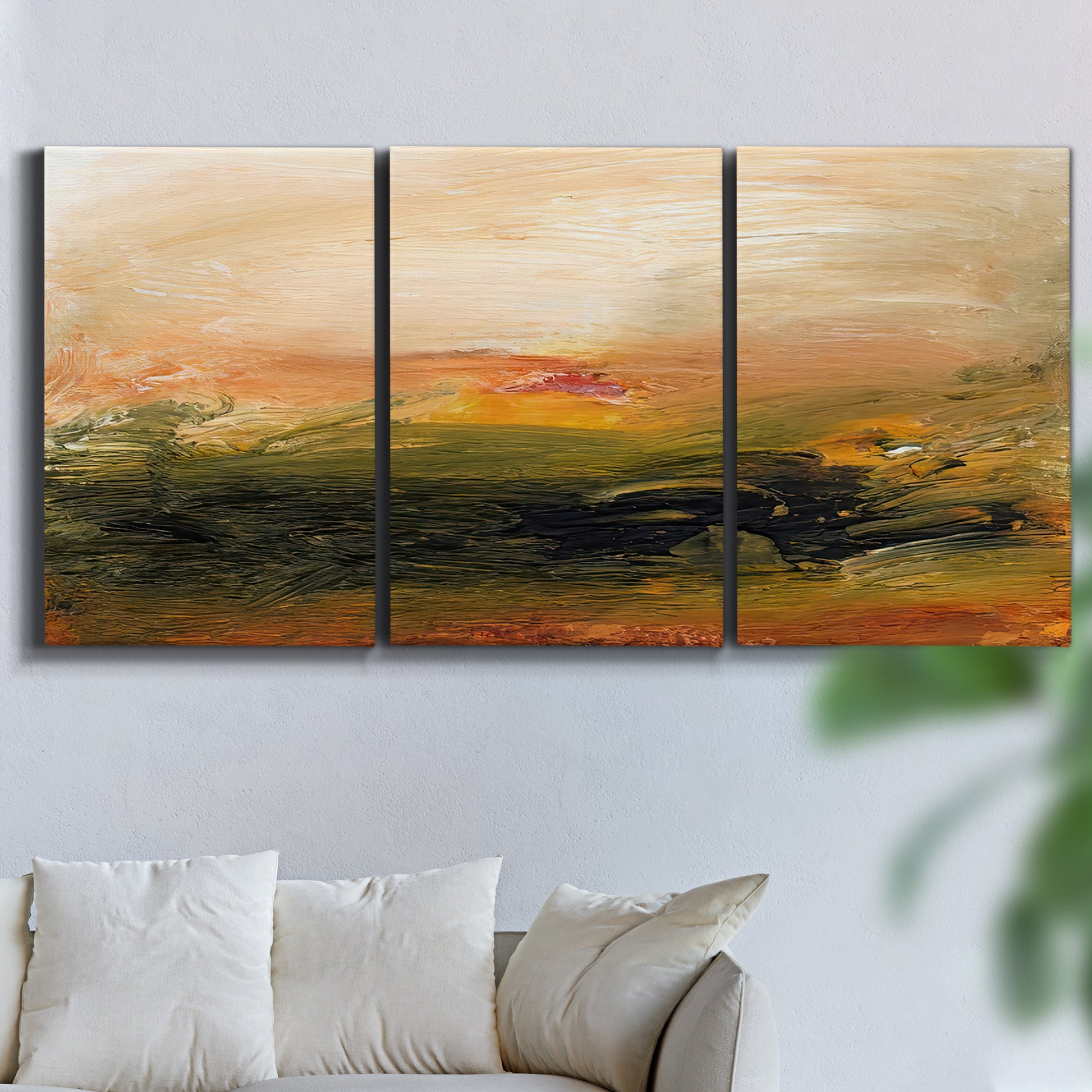 Three-panel canvas wall art featuring soft abstract evening light, displayed in a living room above a sofa.