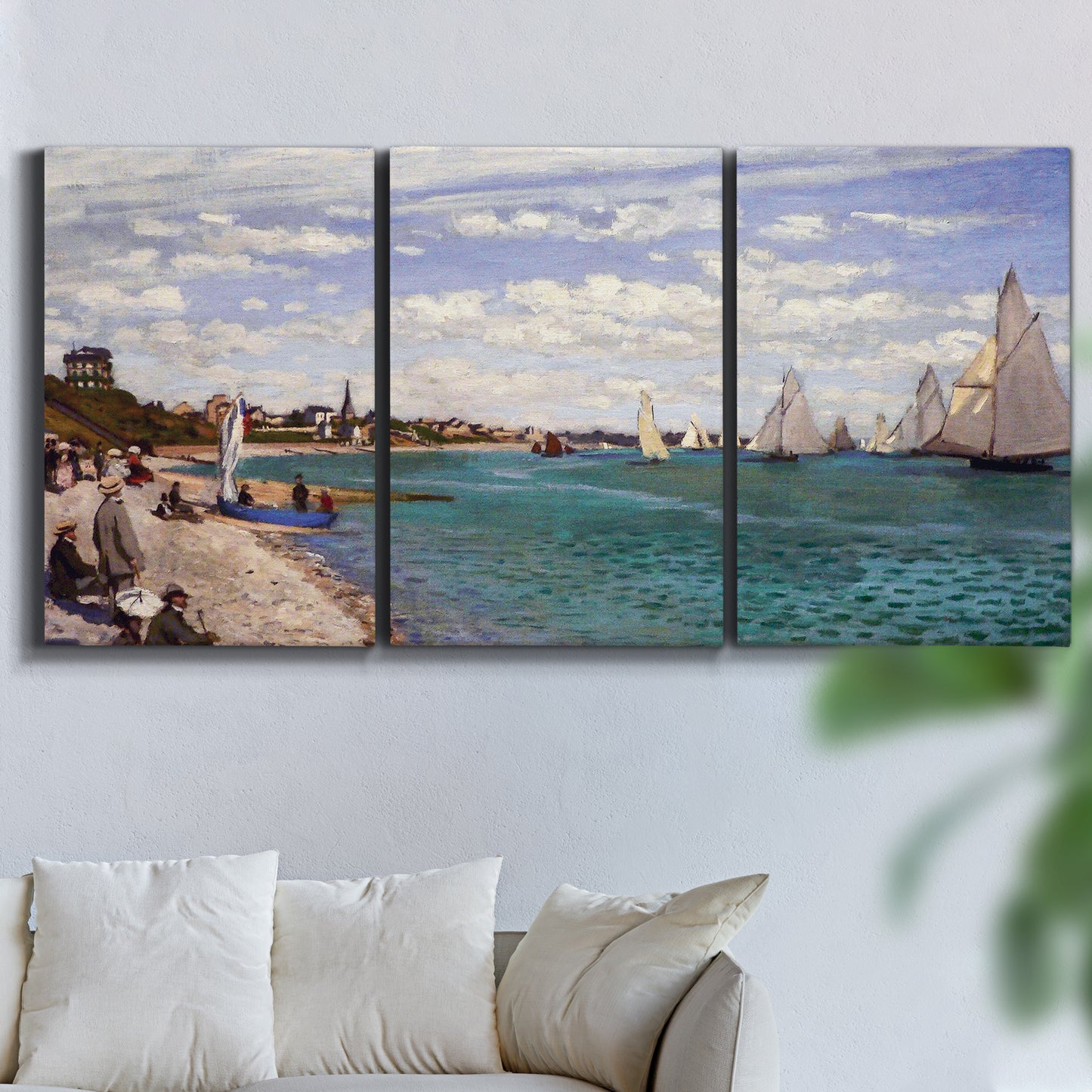 Three-panel canvas wall art featuring river basin with boats, displayed in a living room above a sofa.