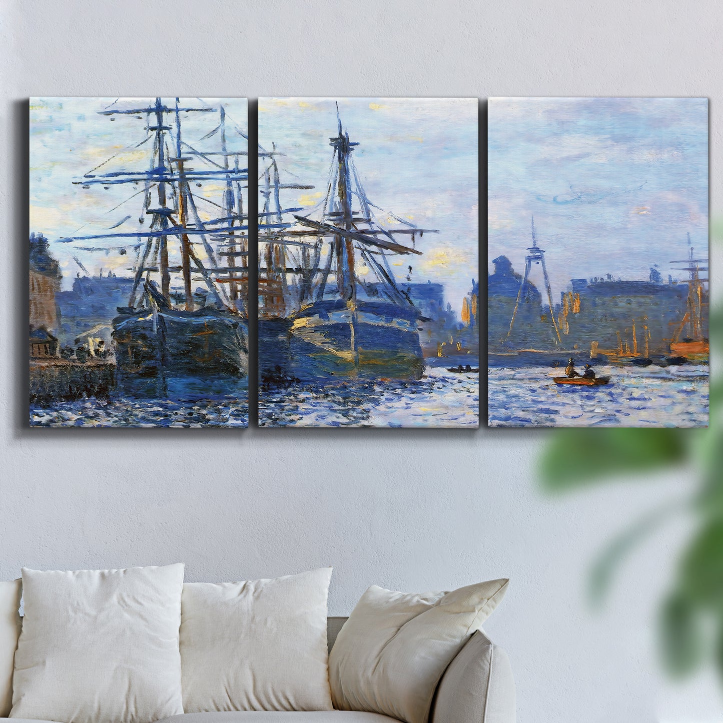 Three-panel canvas wall art featuring industrial dock along harbor, displayed in a living room above a sofa.