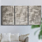Three-panel canvas wall art featuring grid based geometric abstraction, displayed in a living room above a sofa.