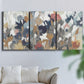 Three-panel canvas wall art featuring abstract flower stand composition, displayed in a living room above a sofa.