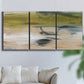 Three-panel canvas wall art featuring minimal abstract water reflections, displayed in a living room above a sofa.