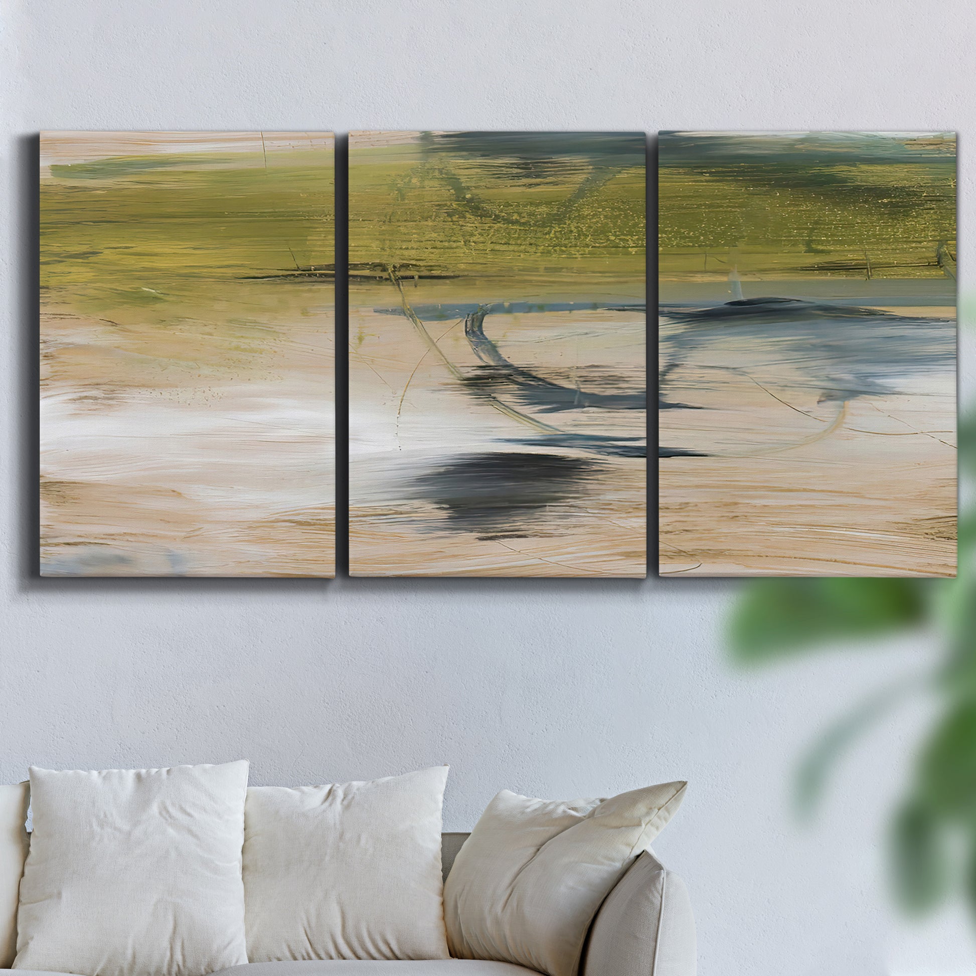 Three-panel canvas wall art featuring minimal abstract water reflections, displayed in a living room above a sofa.
