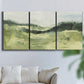 Three-panel canvas wall art featuring rolling hillside countryside landscape, displayed in a living room above a sofa.