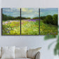 Three-panel canvas wall art featuring pastoral field with wildflowers, displayed in a living room above a sofa.