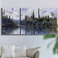 Three-panel canvas wall art featuring quiet river bend near village, displayed in a living room above a sofa.