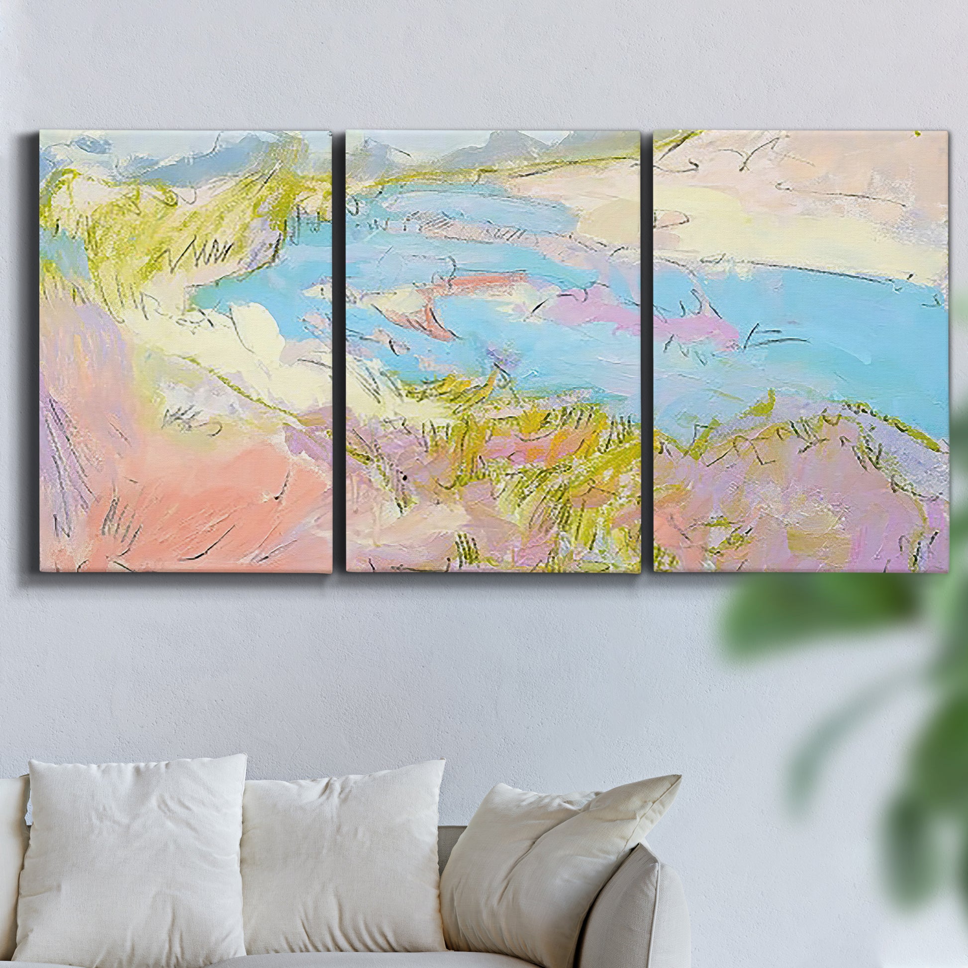 Three-panel canvas wall art featuring geometric mid century abstract blocks, displayed in a living room above a sofa.