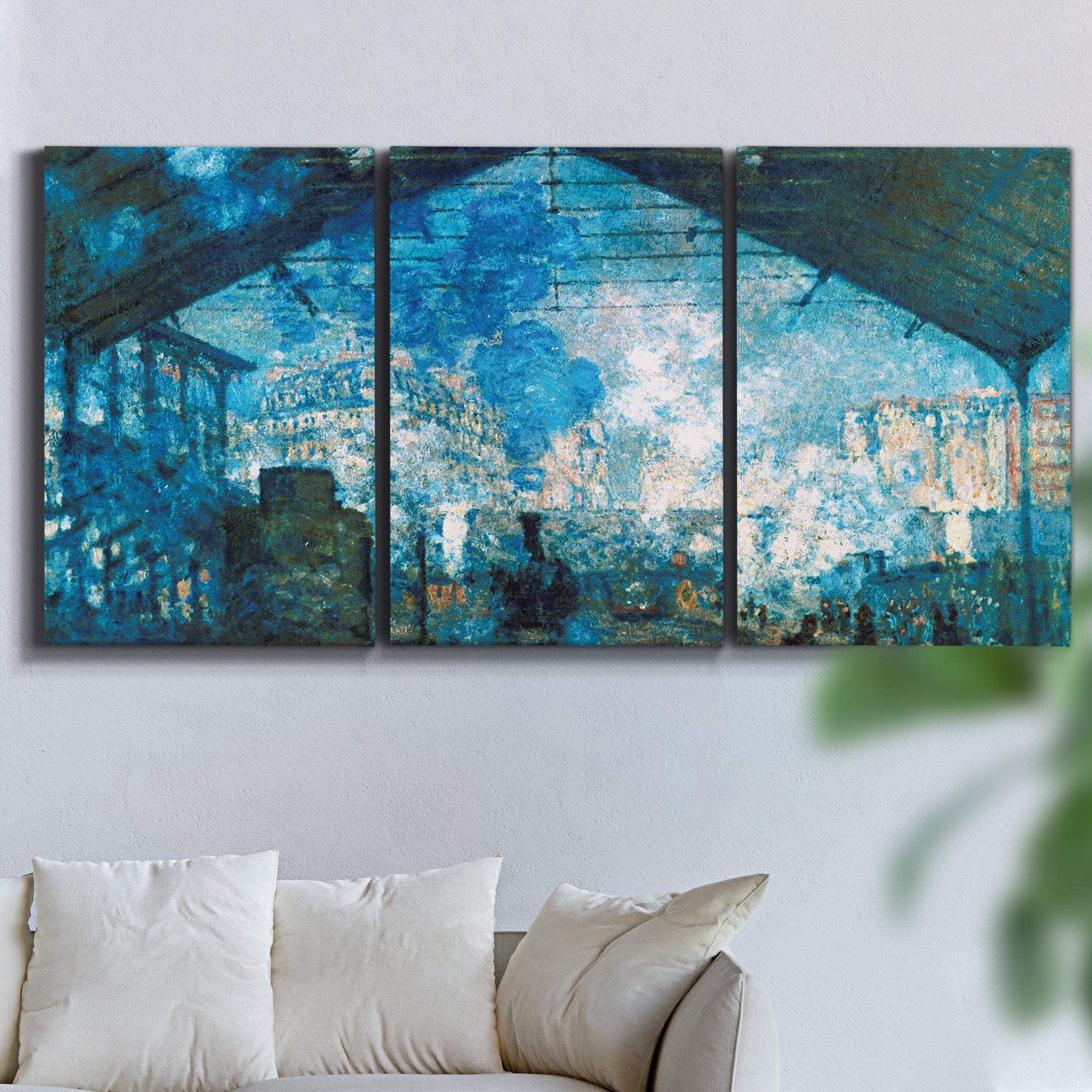Three-panel canvas wall art featuring railway station filled with steam, displayed in a living room above a sofa.