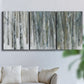 Three-panel canvas wall art featuring abstract birch forest landscape, displayed in a living room above a sofa.