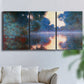 Three-panel canvas wall art featuring misty river surface at dawn, displayed in a living room above a sofa.