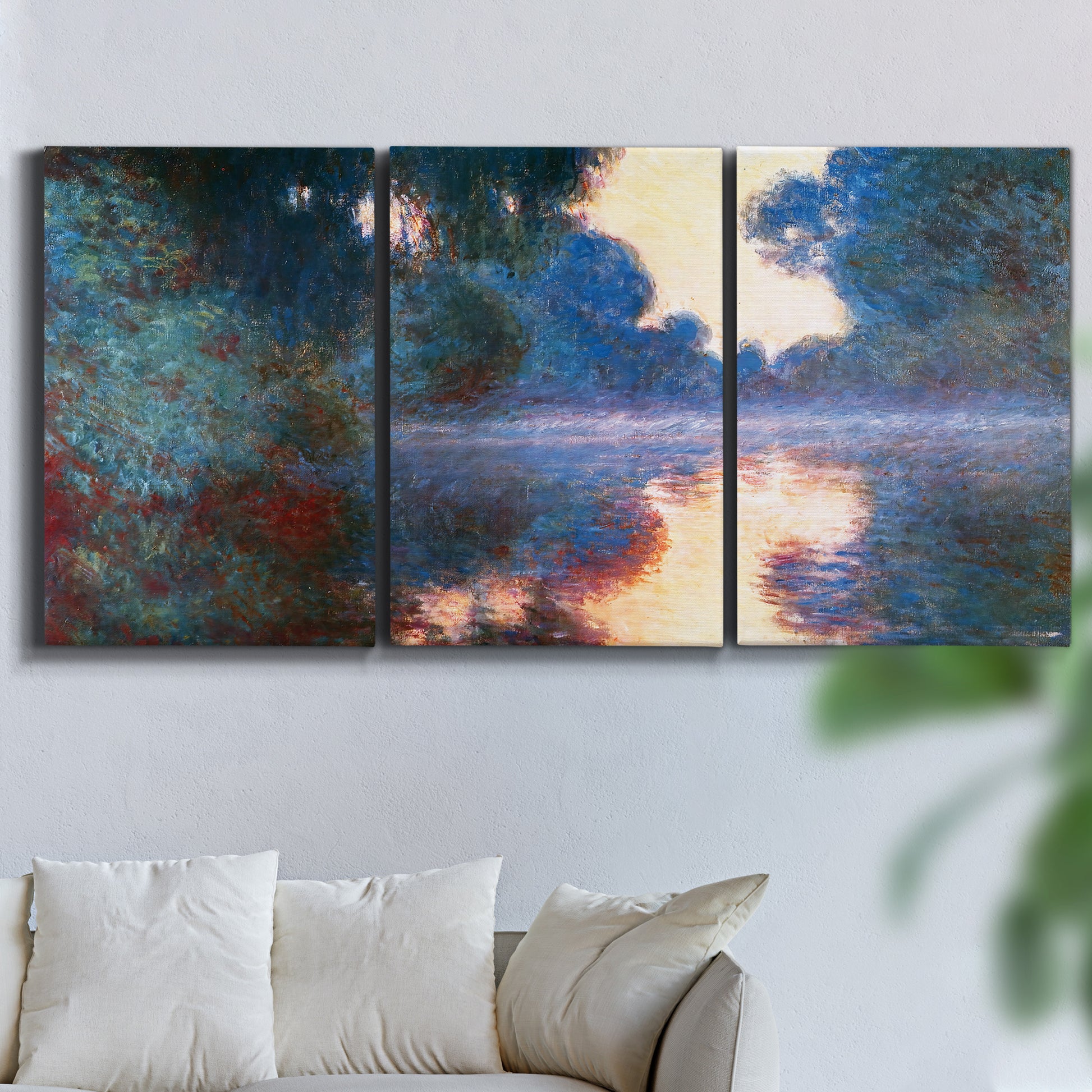 Three-panel canvas wall art featuring misty river surface at dawn, displayed in a living room above a sofa.