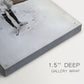 Close-up of a gallery-wrapped canvas corner showing a dignified figure with elegant design elements, highlighting texture and print detail.