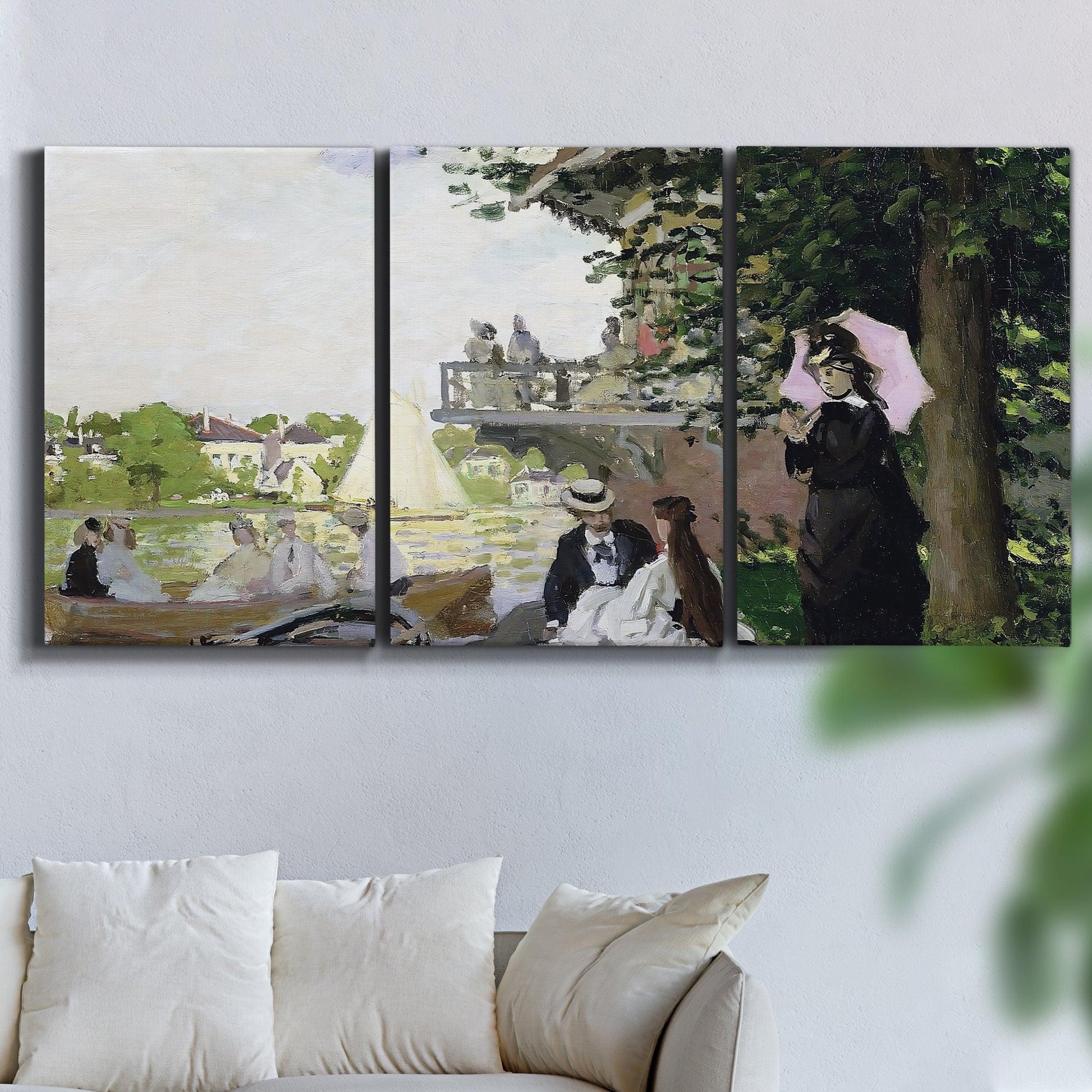 Three-panel canvas wall art featuring garden house beside river, displayed in a living room above a sofa.
