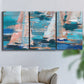 Three-panel canvas wall art featuring graphic pop style sailboats, displayed in a living room above a sofa.