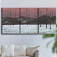 Three-panel canvas wall art featuring winter sunset snowfall landscape, displayed in a living room above a sofa.