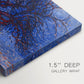 Canvas art print of a stylized red tree with branches against dark background, highlighting texture and gallery-wrapped edges