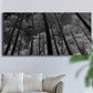 Three-panel canvas wall art featuring riverside houses along canal, displayed in a living room above a sofa.