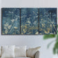 Three-panel canvas wall art featuring dark abstract with rich tonal depth, displayed in a living room above a sofa.