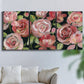Three-panel canvas wall art featuring bold red floral abstraction, displayed in a living room above a sofa.