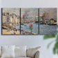 Three-panel canvas wall art featuring evening harbor with reflections, displayed in a living room above a sofa.