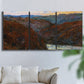 Three-panel canvas wall art featuring impressionist valley landscape, displayed in a living room above a sofa.