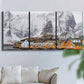 Three-panel canvas wall art featuring winter village street photography, displayed in a living room above a sofa.
