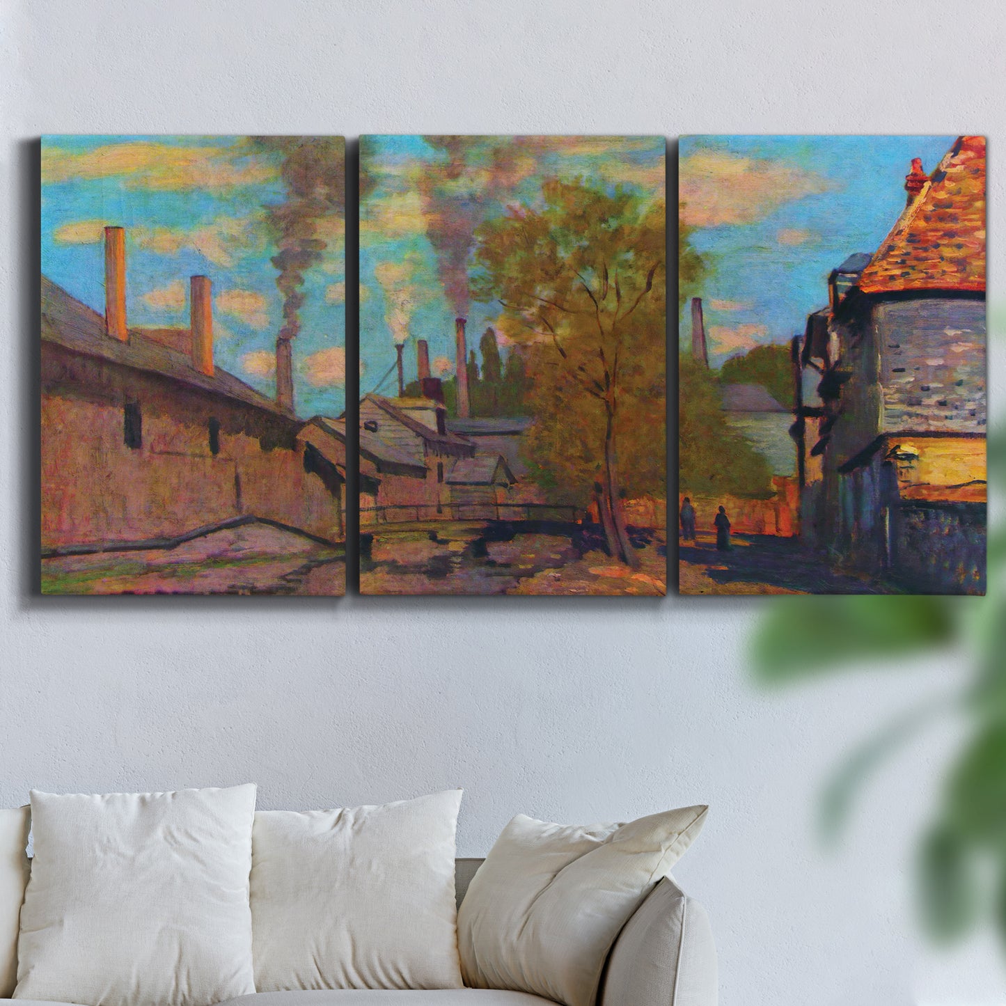 Three-panel canvas wall art featuring wooded stream landscape, displayed in a living room above a sofa.