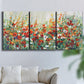 Three-panel canvas wall art featuring colorful garden flowers in bloom, displayed in a living room above a sofa.