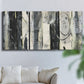 Three-panel canvas wall art featuring vertical abstract tree forms, displayed in a living room above a sofa.