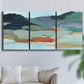 Three-panel canvas wall art featuring vibrant abstract with dramatic motion, displayed in a living room above a sofa.