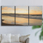 Three-panel canvas wall art featuring quiet tropical shoreline at low tide, displayed in a living room above a sofa.