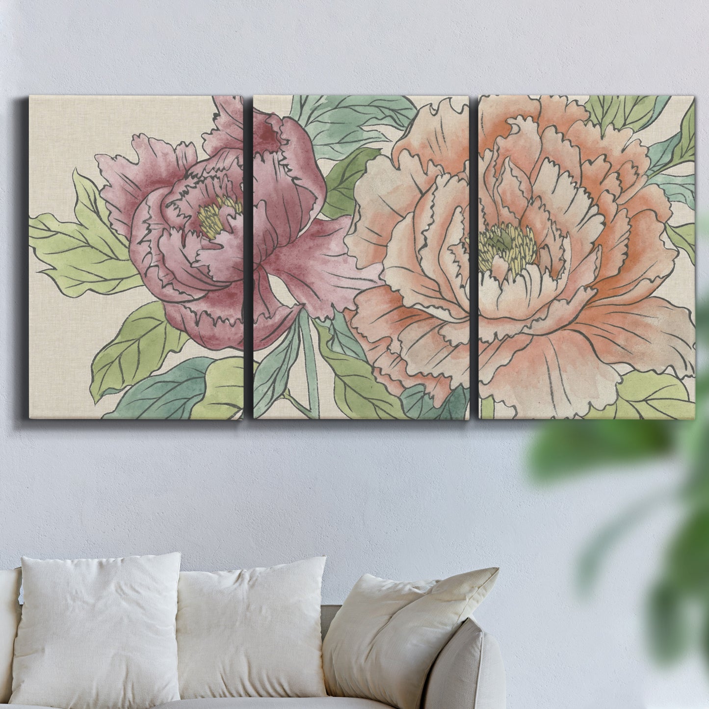 Three-panel canvas wall art featuring pastel peony flower composition, displayed in a living room above a sofa.