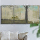 Three-panel canvas wall art featuring tall abstract tree form, displayed in a living room above a sofa.