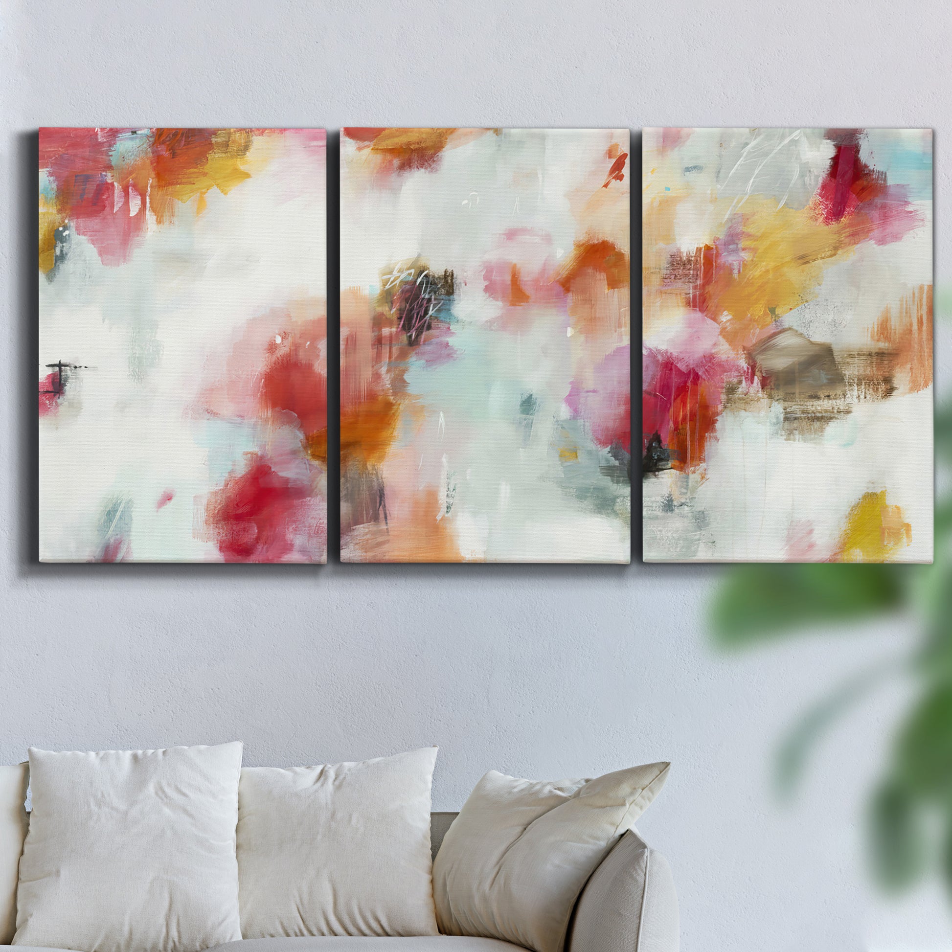 Three-panel canvas wall art featuring abstract directional visual shift, displayed in a living room above a sofa.