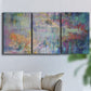 Three-panel canvas wall art featuring abstract evening landscape with depth, displayed in a living room above a sofa.