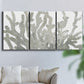 Three-panel canvas wall art featuring monochrome coral texture study, displayed in a living room above a sofa.