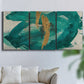 Three-panel canvas wall art featuring interconnected abstract flowing forms, displayed in a living room above a sofa.