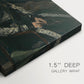 Close-up of a gallery-wrapped canvas corner showing a composed figure with subtle highlights, highlighting texture and print detail.