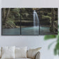 Three-panel canvas wall art featuring waterfall cascading through forest, displayed in a living room above a sofa.