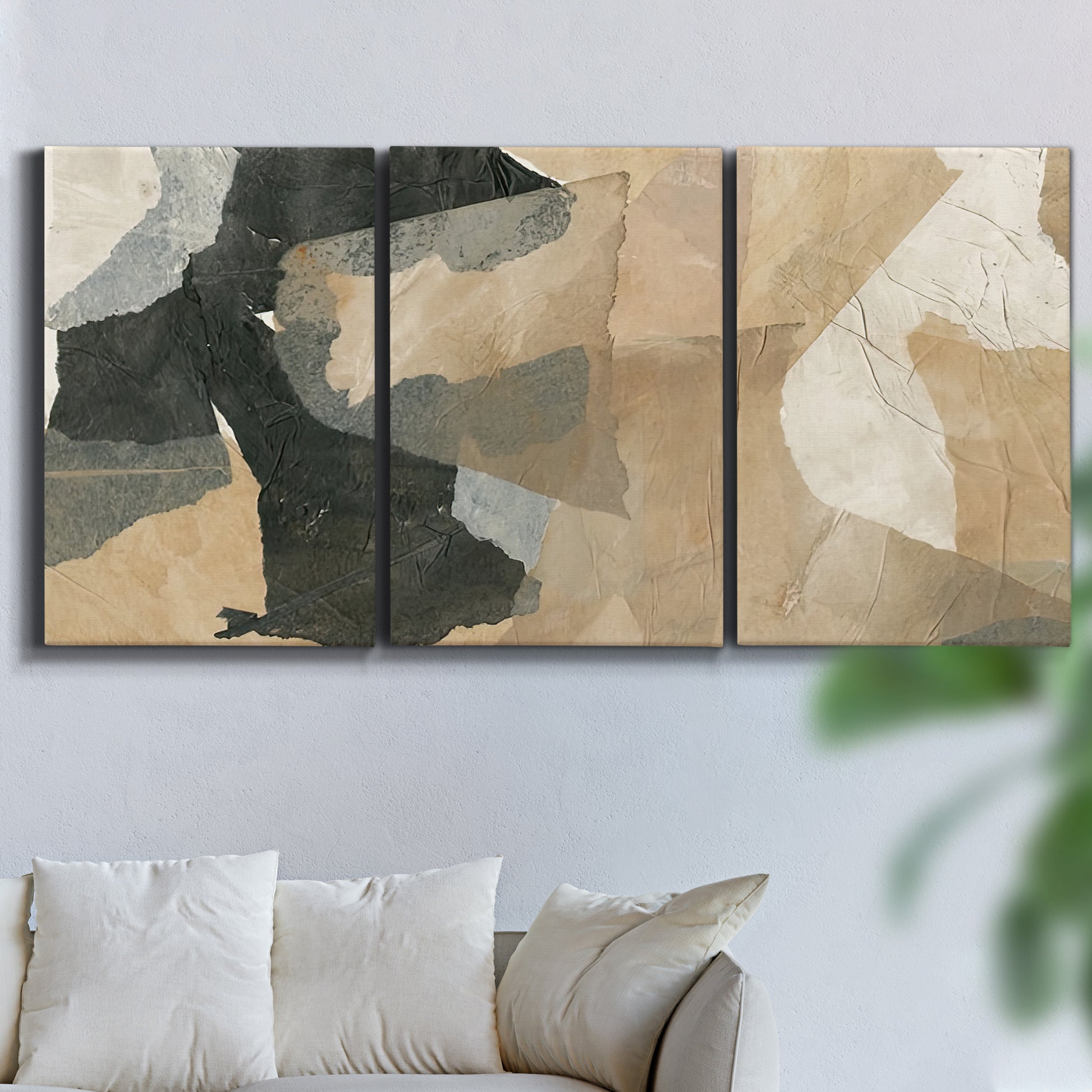 Three-panel canvas wall art featuring blurred mixed media abstract collage, displayed in a living room above a sofa.
