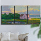 Three-panel canvas wall art featuring farmhouse near coastline landscape, displayed in a living room above a sofa.