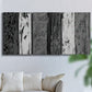 Three-panel canvas wall art featuring brushed metallic abstract textures, displayed in a living room above a sofa.