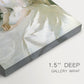 Close-up of a gallery-wrapped canvas corner showing a calm portrait with balanced light, highlighting texture and print detail.