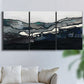 Three-panel canvas wall art featuring abstract passage of time composition, displayed in a living room above a sofa.