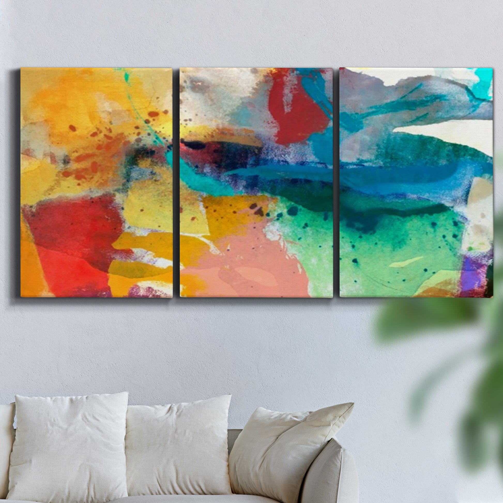 Three-panel canvas wall art featuring layered abstract observational color blocks, displayed in a living room above a sofa.