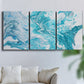 Three-panel canvas wall art featuring rocky coastal tide pool scene, displayed in a living room above a sofa.
