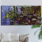 Three-panel canvas wall art featuring water lilies on calm pond, displayed in a living room above a sofa.